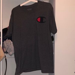 dark grey champion t shirt with navy blue logo